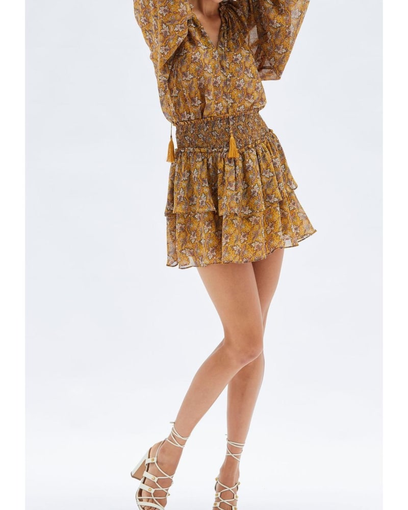 Front of a model wearing a size L Tarsus Mini Skirt in Multi in Multi by MINKPINK. | dia_product_style_image_id:345875